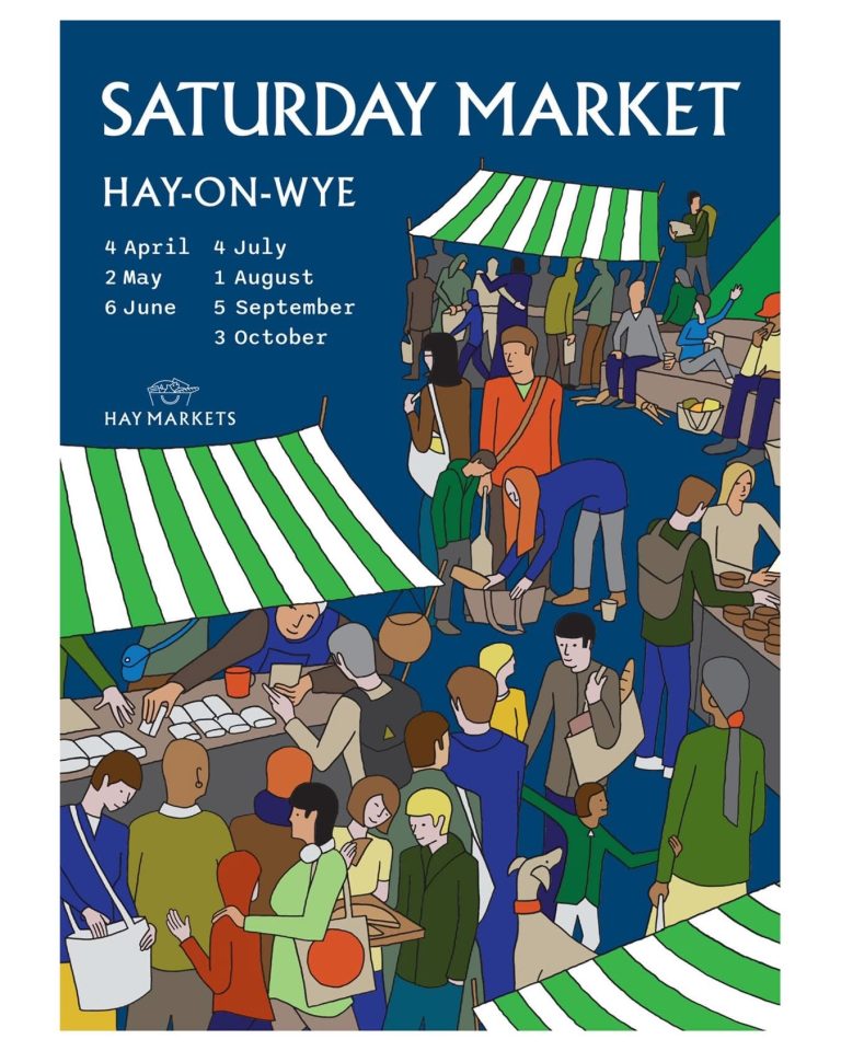 Hay Saturday Market in Hay-on-Wye with market stalls and shoppers