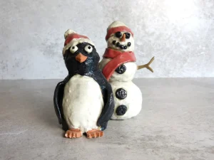 Handmade ceramic penguin and snowman Christmas figurines