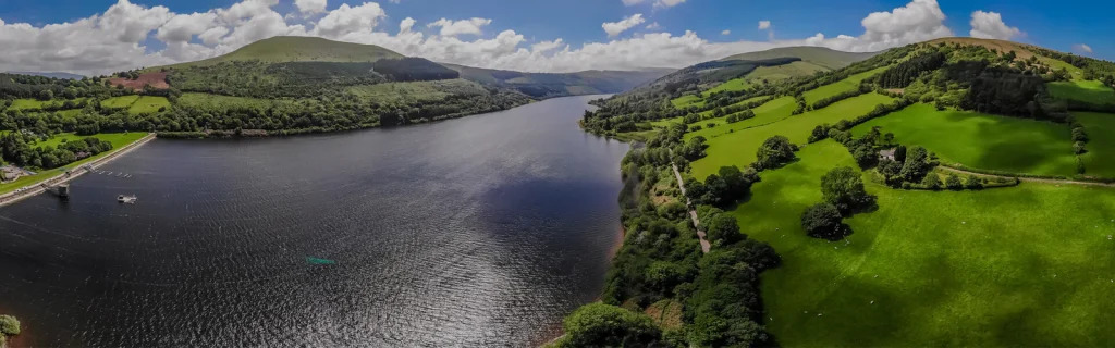 Reservoir and green hills in the Brecon Beacons