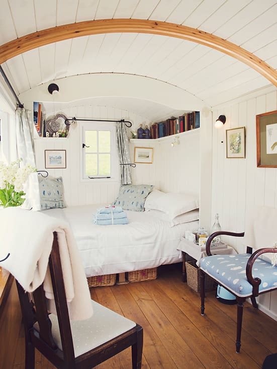 Bright double bedroom inside the Shepherd’s Hut at Argoed Barns