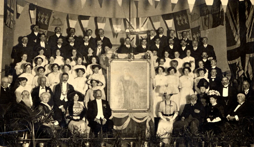 Historic group photograph used to illustrate Brecon's community stories