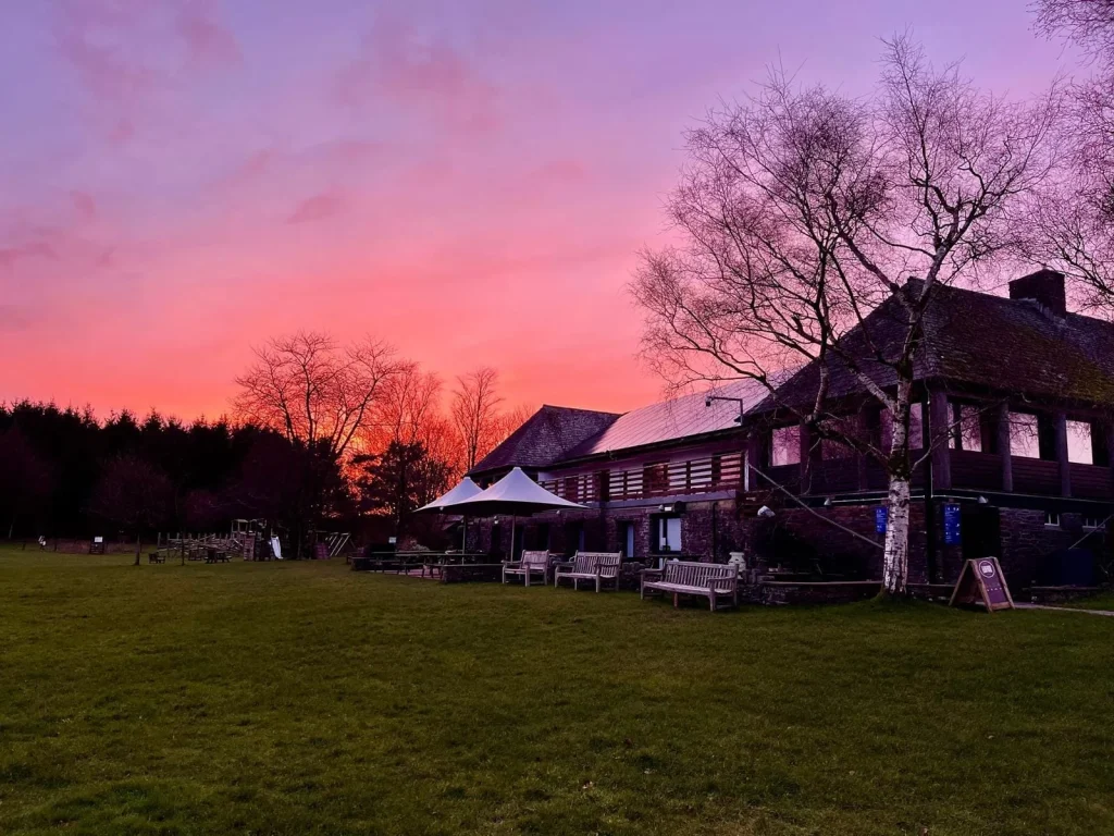Training venue beneath a colourful night sky at Mynydd Illtud with Dark Sky Wales