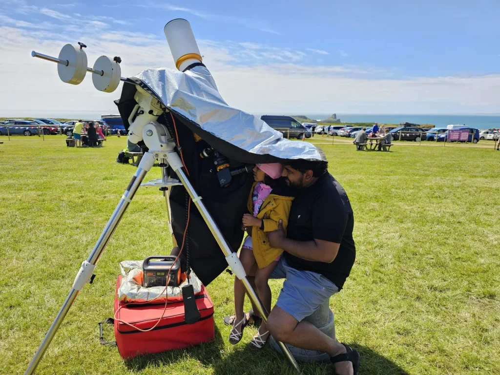Participant using specialist observing equipment with Dark Sky Wales