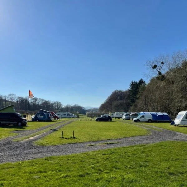 Caravans on spacious grass pitches at Glanusk Estate