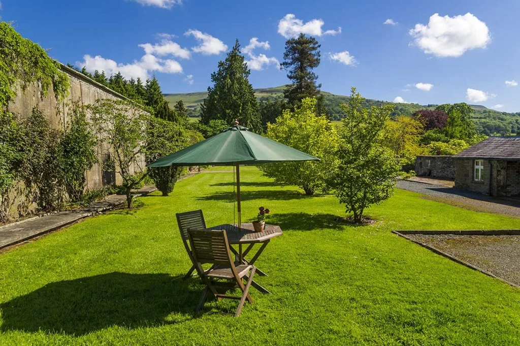 Holiday cottage and private lawn at Glanusk Estate