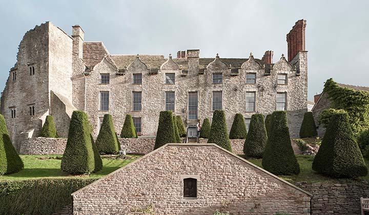 Hay Castle in Hay-on-Wye, showing the medieval tower and Jacobean mansion