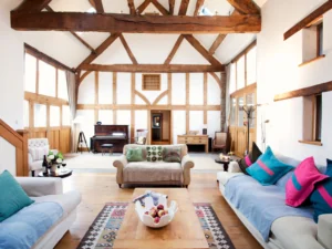 Spacious timber-framed living room in the Holidaycottages.co.uk collection