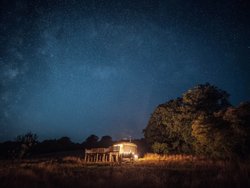 Kaya glamping stay beneath a star-filled night sky at Blackhill Farm