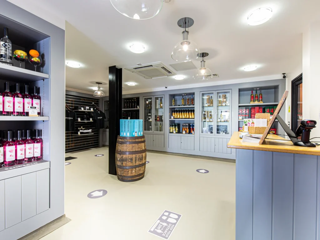 Bottles displayed in the shop at Penderyn Distillery
