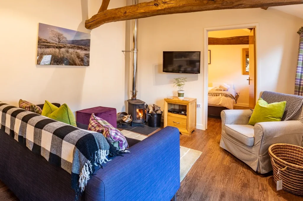 Comfortable living room inside a Ty Newydd Holidays cottage