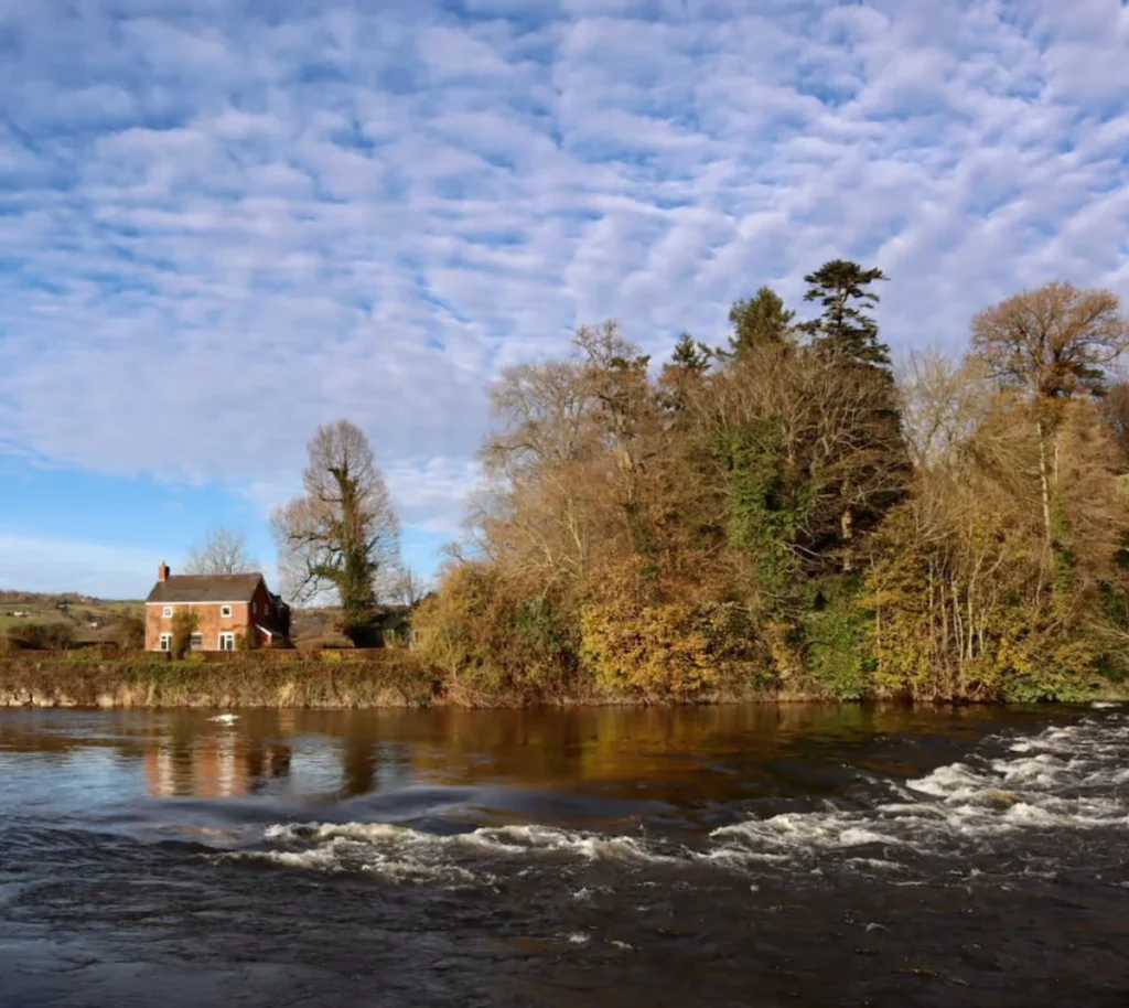The River Wye flowing through a rural Mid Wales landscape