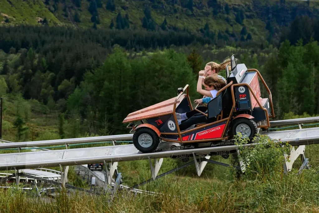 Visitors riding the Tower Coaster at Zip World Tower Colliery