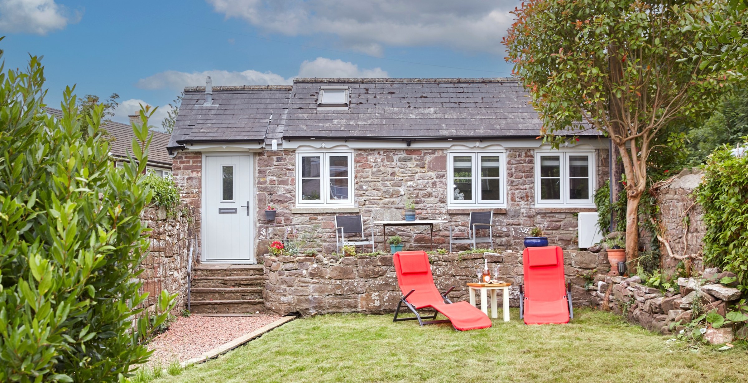 Stone exterior and front garden at Garden Cottage in Talybont-on-Usk