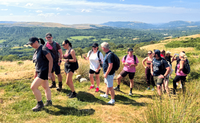 A group walking through the hills during an Adventure Britain weekend